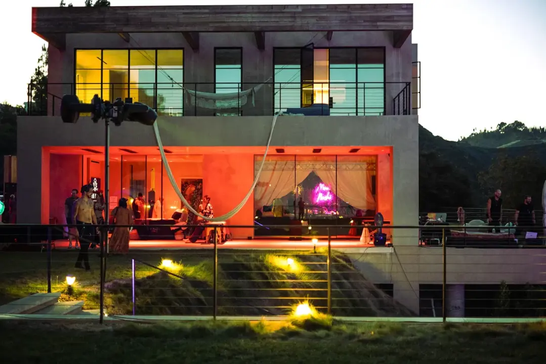 Private club exterior during an evening event
