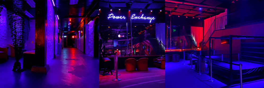 club interior with neon lighting, lounge areas and play spaces