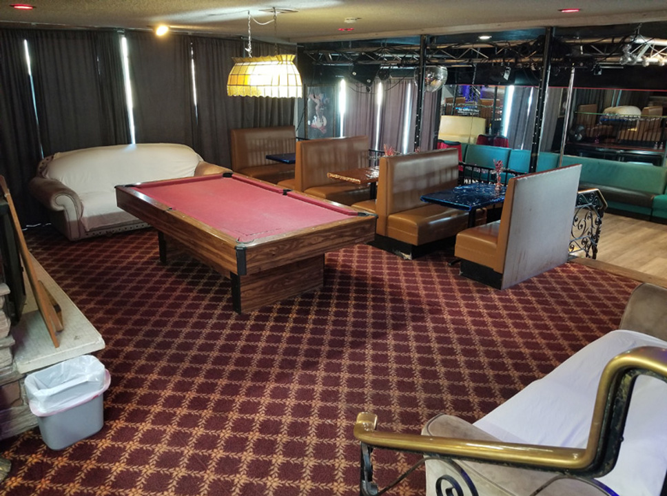 Billiards table and lounge seating