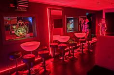 Club KISS red lounge interior at Twist SF in San Francisco, California