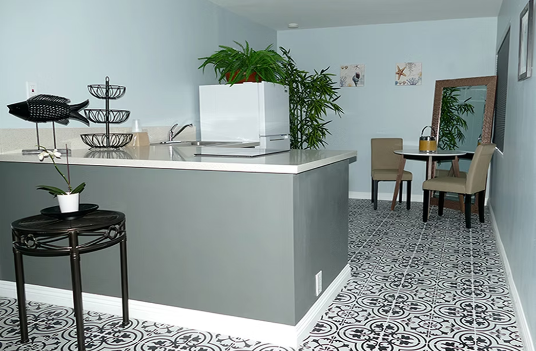 Kitchenette and dining area inside a guest room
