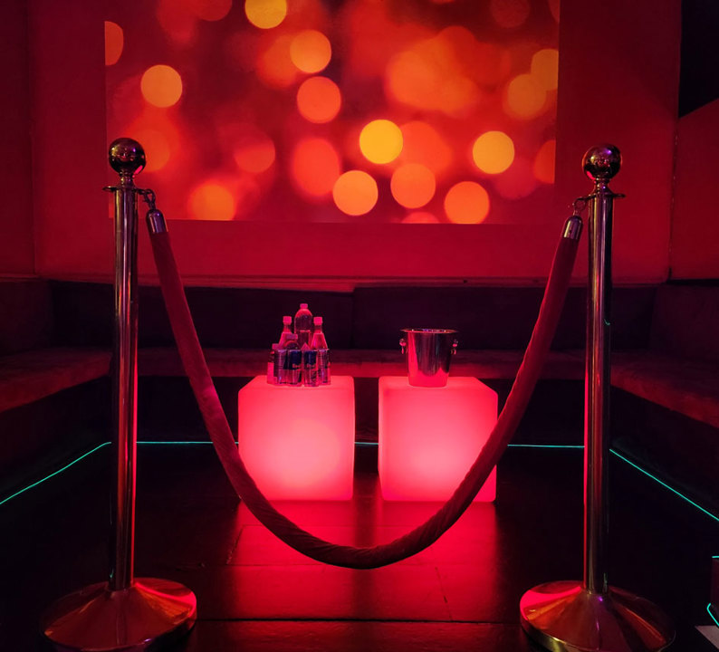 Red-lit VIP area
