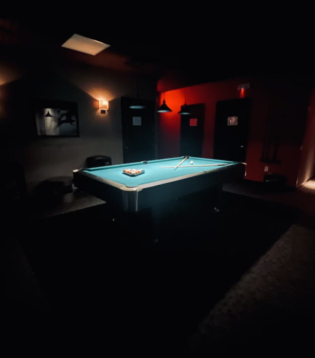 Billiards room with pool table