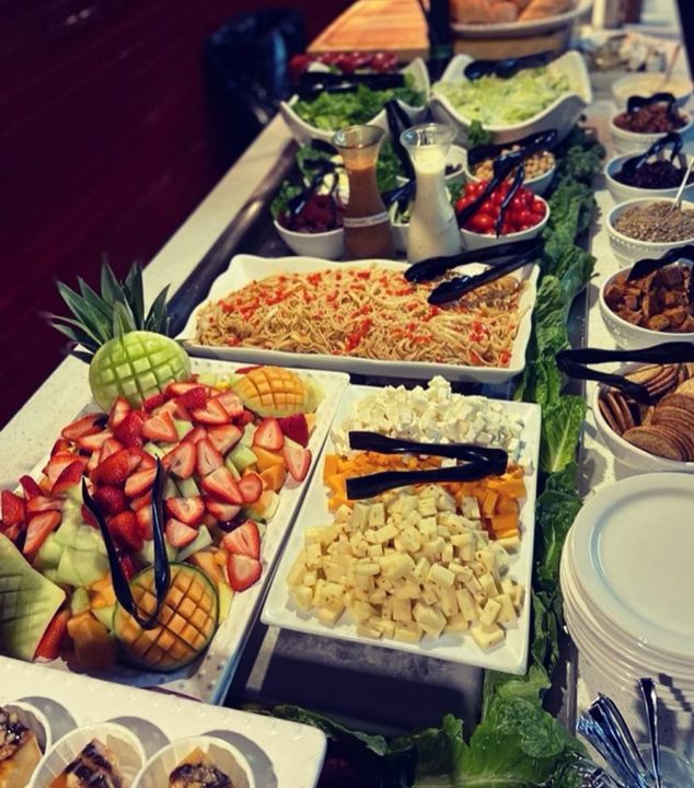 Buffet with fruit, cheese and appetizers