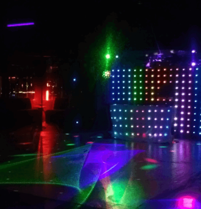 Interior with colorful LED lights and dance floor