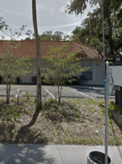 Minglers Social Club exterior and parking area in Daytona Beach, Florida