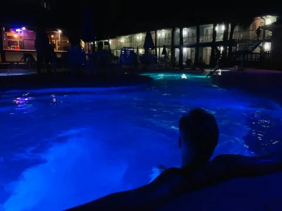 Swimming pool illuminated at night