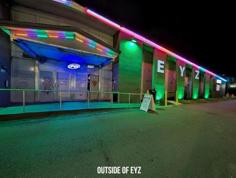 Eyz Wide Shut neon-lit front entrance in Tampa, Florida
