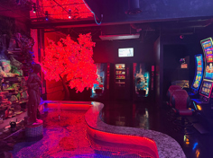 Tokyo Valentino Lifestyle Club red-lit lounge interior in Atlanta, Georgia
