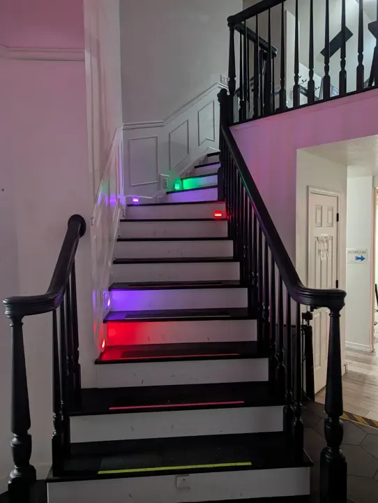 Staircase with colorful step lighting