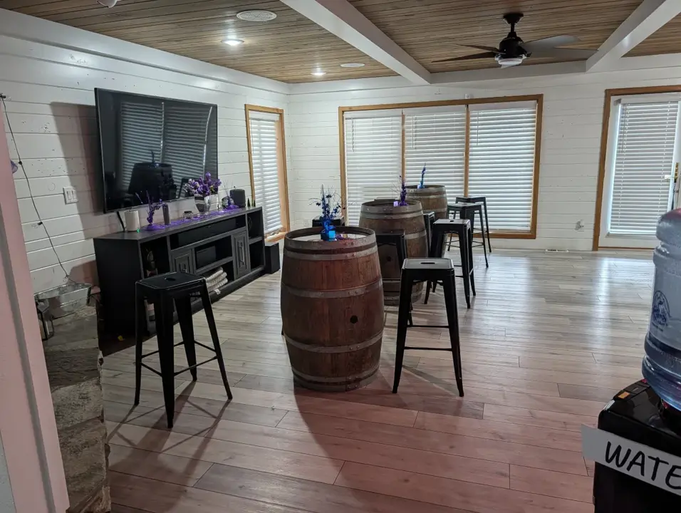 Lounge with barrel tables and seating