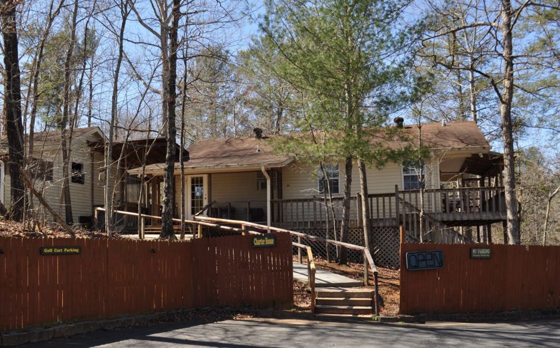 Mountain Creek Grove Charter House surrounded by woodland