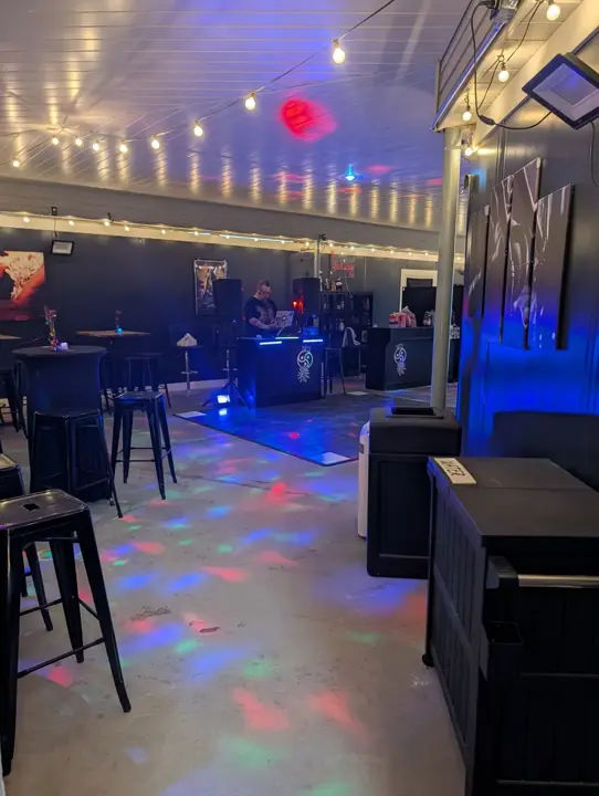 DJ area with colorful party lighting