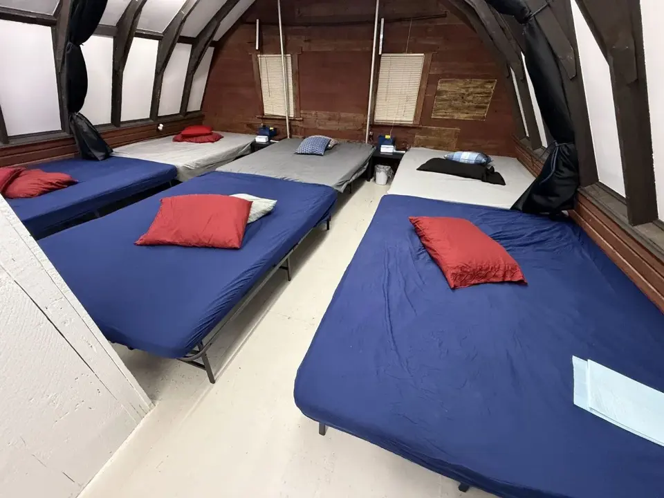 Upstairs play room with multiple beds