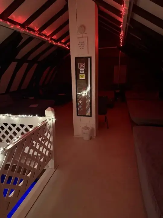 Upstairs play area with red ambient lighting