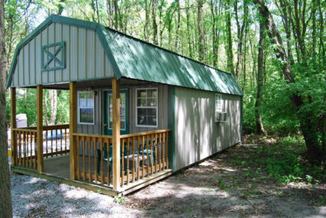 Cabin surrounded by woods