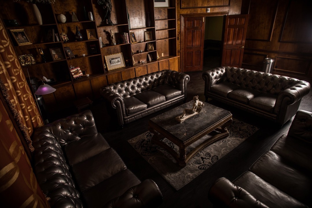 Dark leather lounge area