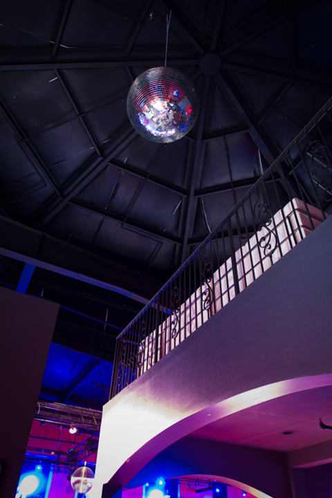 Disco ball and illuminated club interior