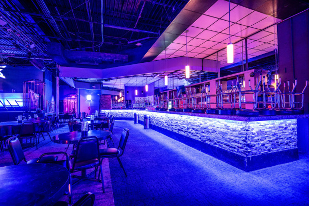 Bar and illuminated club interior