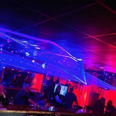 Wild Walkers bar interior with blue and pink laser lighting in Dearborn Heights, Michigan