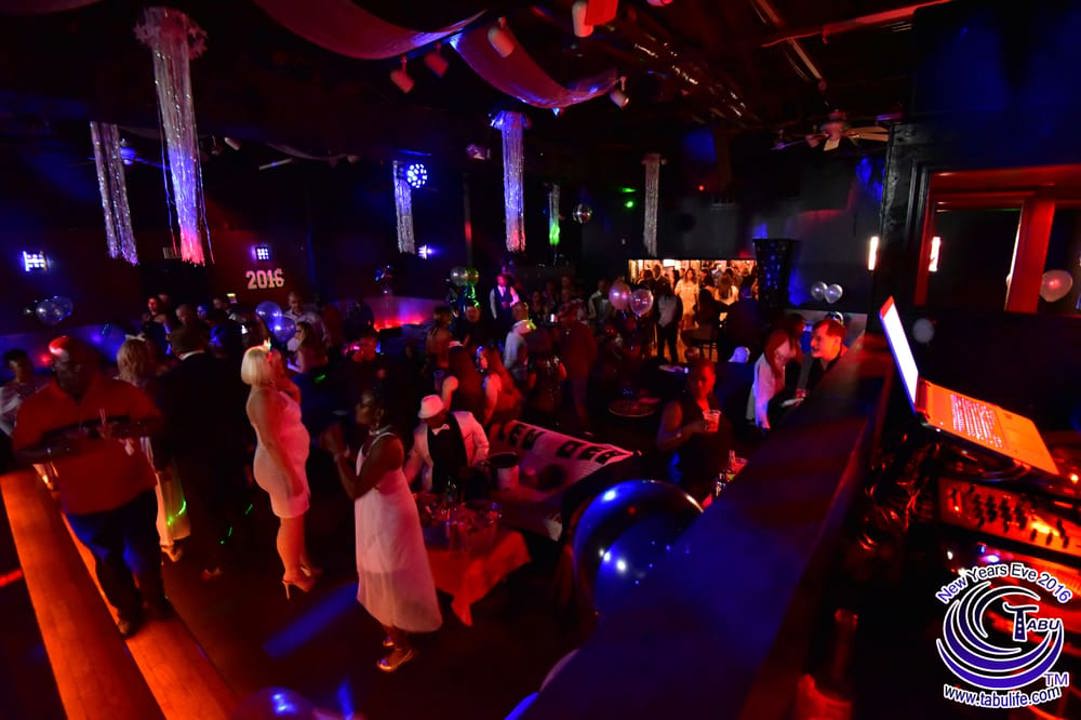 Party floor and DJ area with colorful lighting