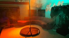 Forbidden Omaha lounge interior with dance pole and seating in Omaha, Nebraska