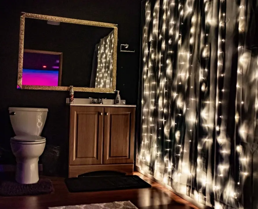 Private room vanity area with illuminated curtain