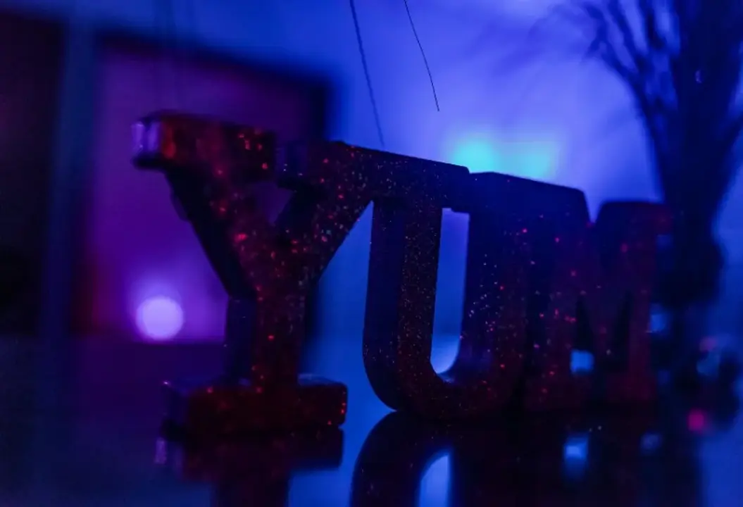 Decorative glitter display under blue and purple lighting