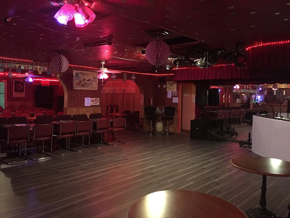 Club interior with seating and dance floor