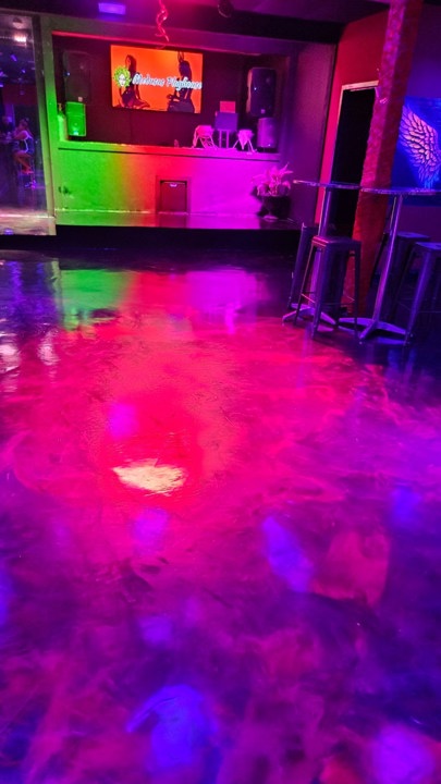 Colorful dance floor and DJ booth