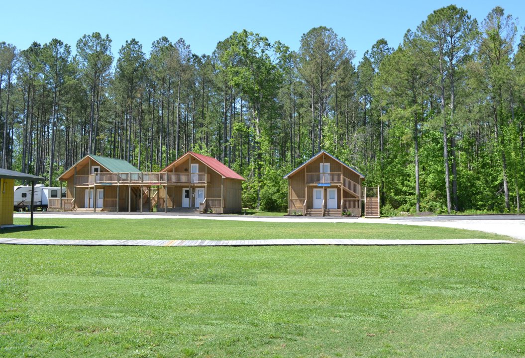 Wooden bungalows across the lawn