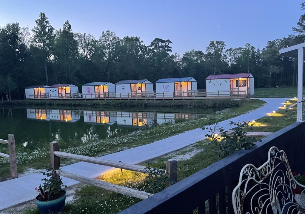 Cabins beside the pond at dusk