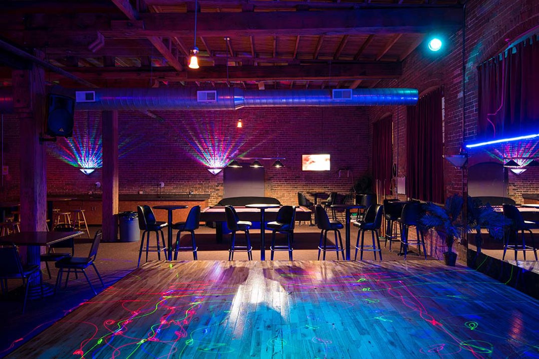 Iluminated dance floor and lounge seating