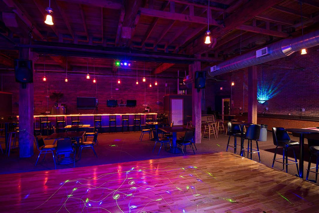 Nightclub interior with dance floor and bar