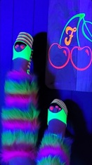 Club Flavor Ohio neon cherry wall decor under blacklight in Massillon, Ohio