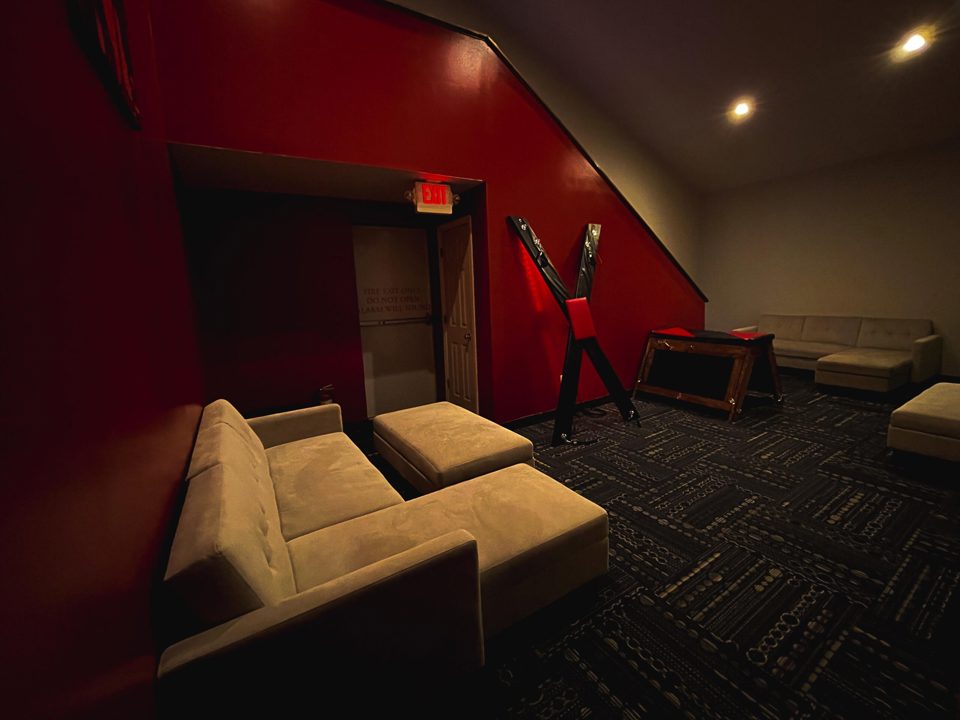 BDSM play room with St. Andrew's cross