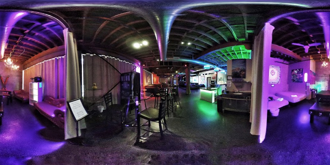 Lounge and bar with purple and green lighting